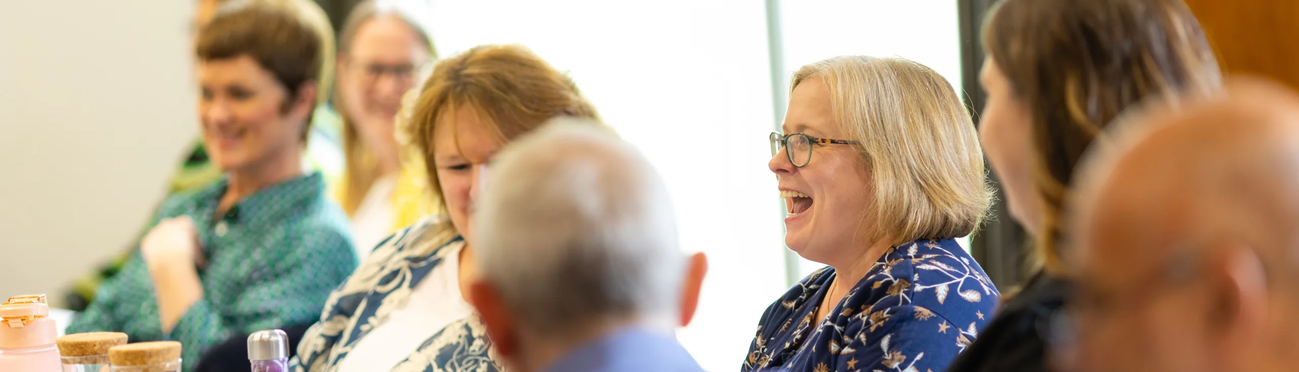 Staff talking at a team day