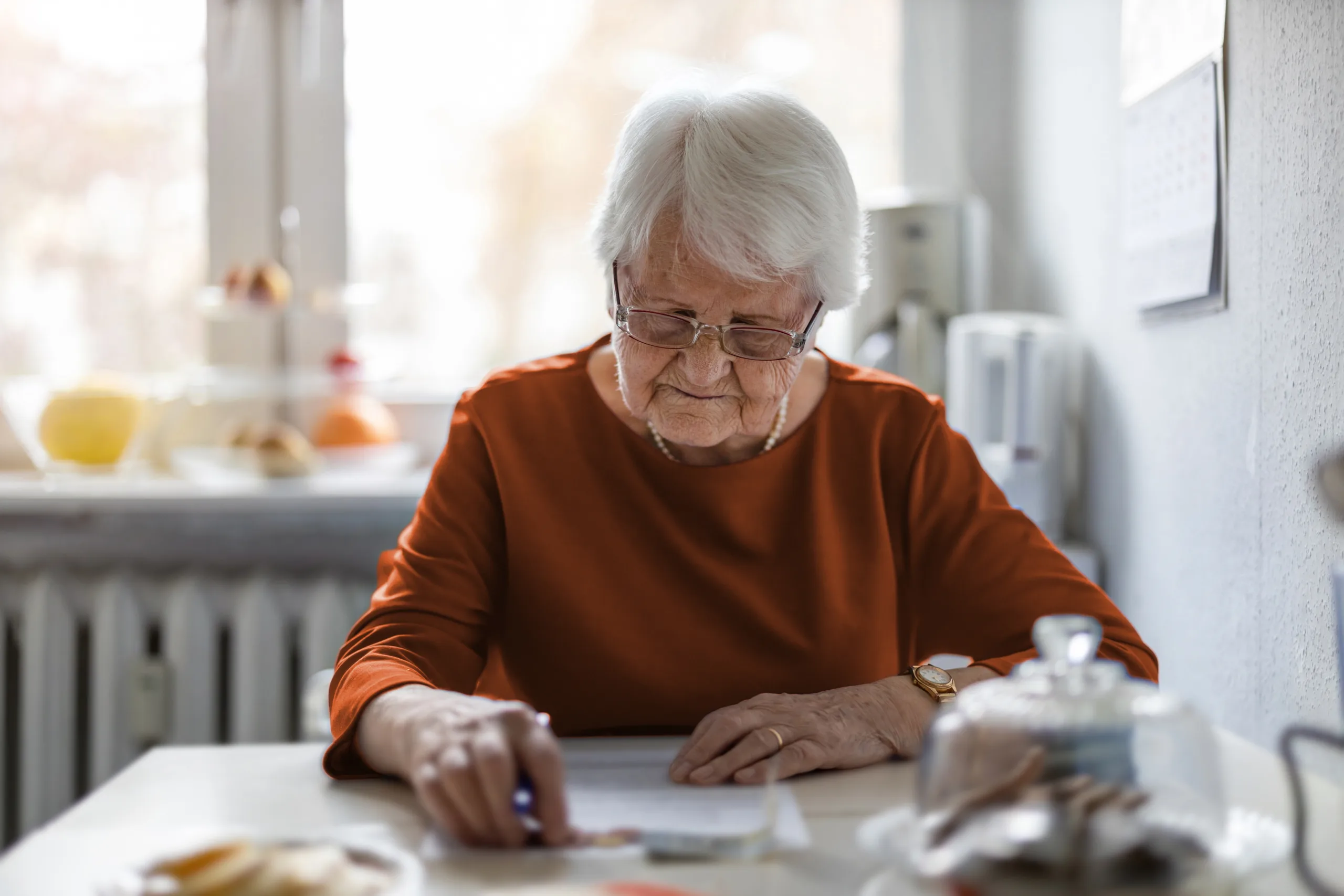 Older woman reading health information